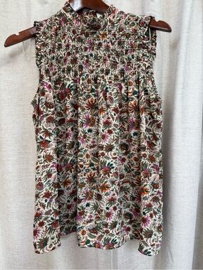 Anthropologie Maeve Floral Smocked Cream top with Pink, Orange and Green Accents